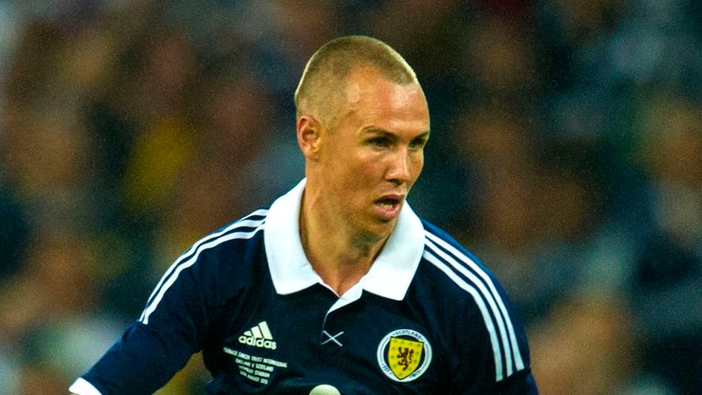 Goalscorer Kenny Miller in action for Scotland in their 3-2 friendly defeat to England at Wembley in 2013