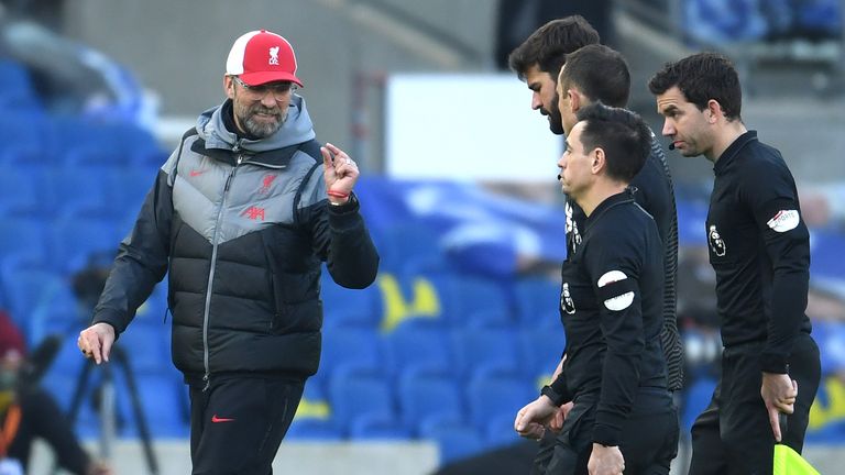 Klopp talks to the officials after their 1-1 draw with Brighton.
