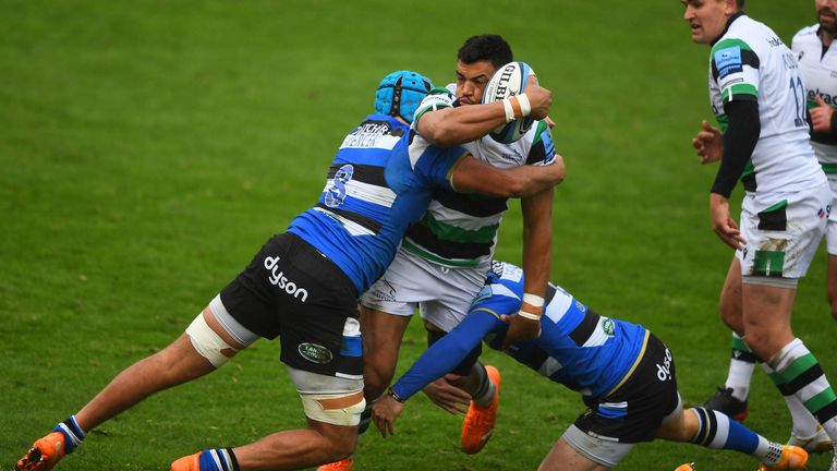 Luther Burrell of Newcastle Falcons is tackled by Zach Mercer of Bat