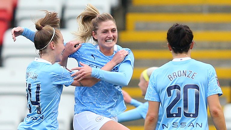 Laura Coombs celebrates scoring Man City's second goal against Man Utd