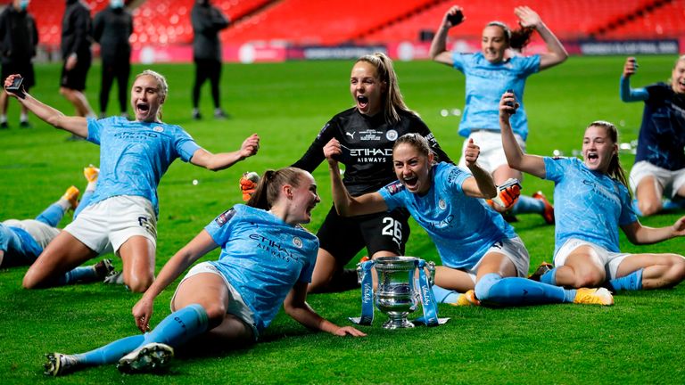 City players celebrate their extra-time win at Wembley