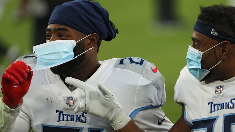  Cornerback Malcolm Butler #21 of the Tennessee Titans celebrates with a face mask after defeating the Baltimore Ravens