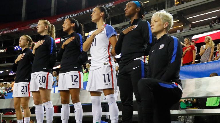  Megan Rapinoe #15 kneels during the National Anthem prior to the match between the United States and the Netherlands at Georgia Dome on September 18, 2016 in Atlanta, Georgia