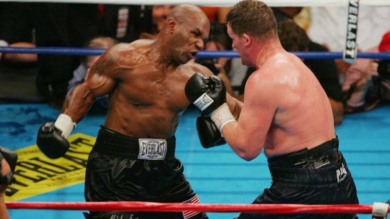 WASHINGTON - JUNE 11:  Mike Tyson throws a punch at Kevin McBride during their heavyweight bout on June 11, 2005 at the MCI Center in Washington, DC.  McBride was declared winner when Tyson quit after the sixth round. (Photo By Jamie Squire/Getty Images) *** Local Caption *** Mike Tyson;Kevin McBride