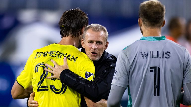 NASHVILLE, TN - AUGUST 30:  Head coach Gary Smith of Nashville SC celebrates with Walker Zimmerman #25 and Joe Willis #1 after the match against the Inter Miami at Nissan Stadium on August 30, 2020 in Nashville, Tennessee. Nashville defeats Miami 1-0.
