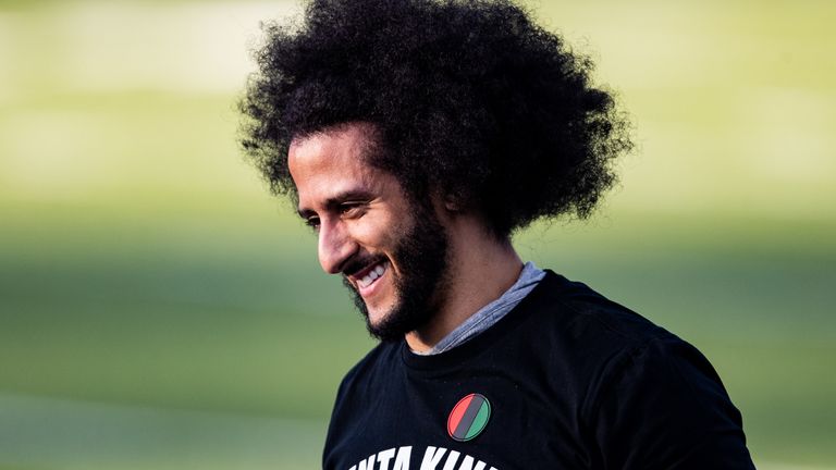  Colin Kaepernick looks on during his NFL workout held at Charles R Drew high school on November 16, 2019 in Riverdale, Georgia