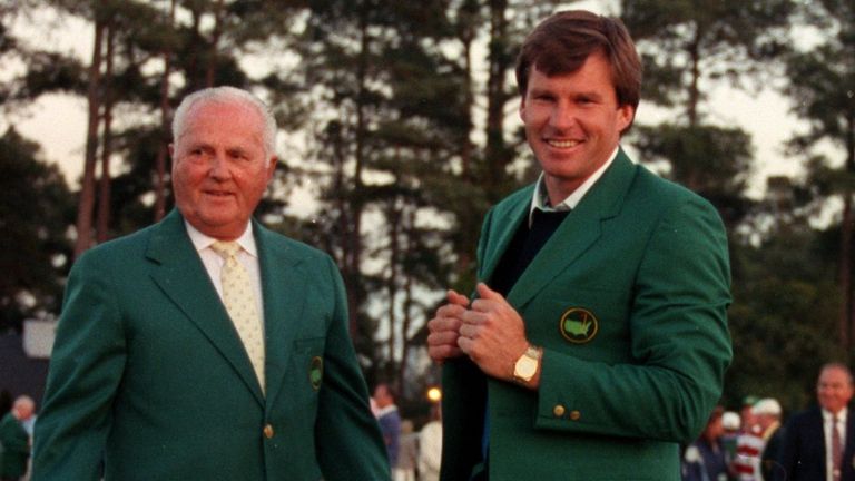 Nick Faldo is presented with the Green Jacket after winning The Masters in 1990