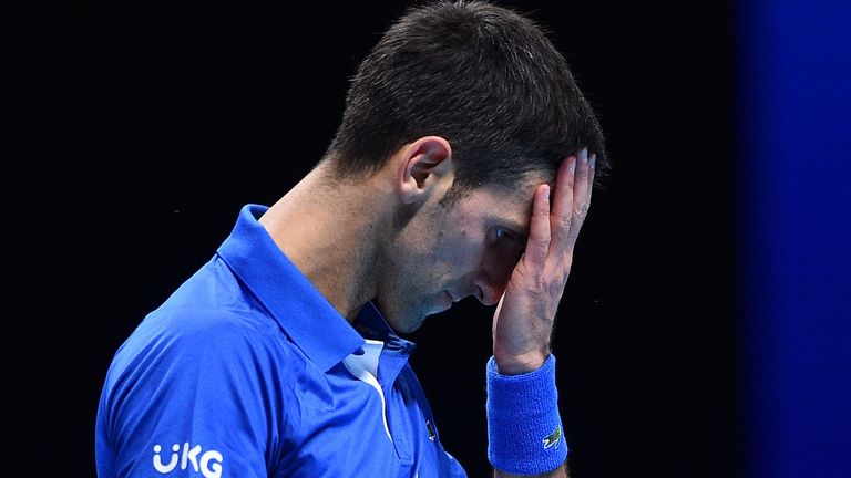 Novak Djokovic reacts during the match against Russia's Daniil Medvedev during their men's singles round-robin match on day four of the ATP World Tour Finals tennis tournament at the O2 Arena in London on November 18, 2020.