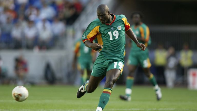 Papa Bouba Diop of Senegal charges forward during the FIFA World Cup Finals 2002 Group A match between Uruguay and Senegal played at the Suwon World Cup Stadium, in Suwon, South Korea on June 11, 2002. The match ended in a 3-3 draw