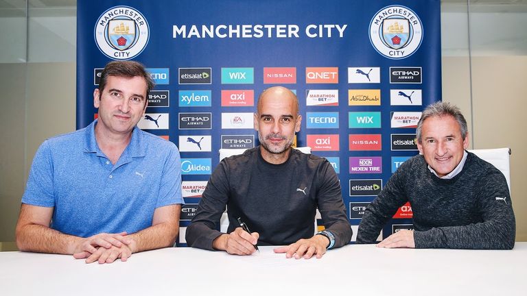Pep Guardiola (cente) has signed a new deal until 2023