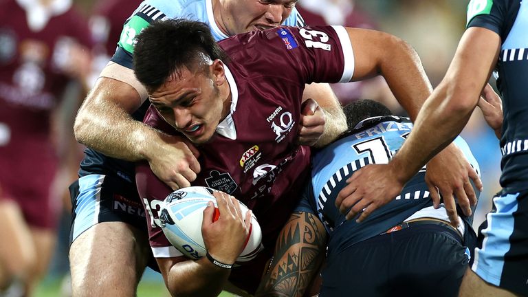 ADELAIDE, AUSTRALIA - NOVEMBER 04: Tino Faasuamaleaui of the Maroons is tackled during game one of the 2020 State of Origin series between the Queensland Maroons and the New South Wales Blues at the Adelaide Oval on November 04, 2020 in Adelaide, Australia. (Photo by Cameron Spencer/Getty Images)