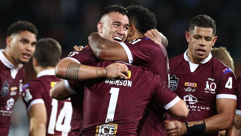 Queensland's players celebrate their win over New South Wales in Adelaide