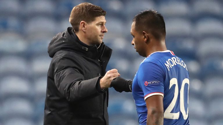 Rangers manager Steven Gerrard fist bumps Alfredo Morelos after the draw with Benfica