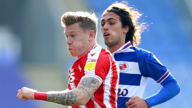 Stoke's James McClean is challenged by Reading's Tomas Esteves