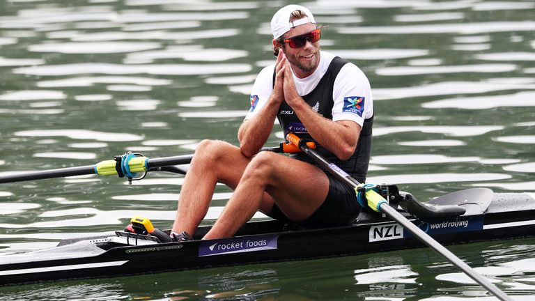 LINZ, AUSTRIA - SEPTEMBER 01: Robbie Manson of New Zealand reacts by making a praying action after he qualifies his boat for the Tokyo 2020 Olympic games in the B final during Day Eight of the 2019 World Rowing Championships on September 01, 2019 in Linz-Ottensheim, Austria. (Photo by Naomi Baker/Getty Images)

