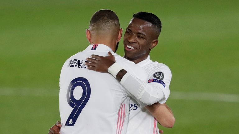 Rodrygo celebrates at the final whistle after meeting Vinicius' pass