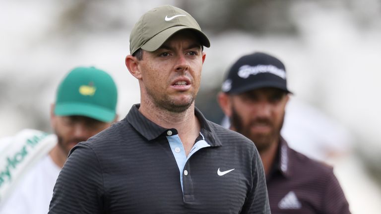 Rory McIlroy and Dustin Johnson during the first round of The Masters