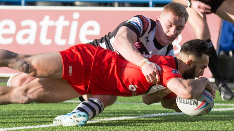 London Broncos' Eloi Pelissier scores a try against Widnes in February 2020