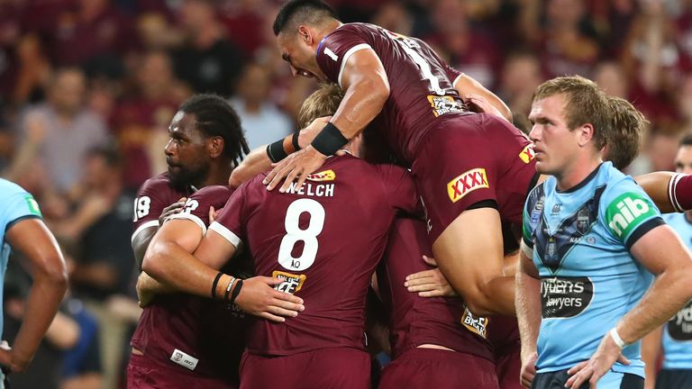 BRISBANE, AUSTRALIA - NOVEMBER 18: Maroons celebrate a try by Harry Grant during game three of the State of Origin series between the Queensland Maroons and the New South Wales Blues at Suncorp Stadium on November 18, 2020 in Brisbane, Australia. (Photo by Chris Hyde/Getty Images)