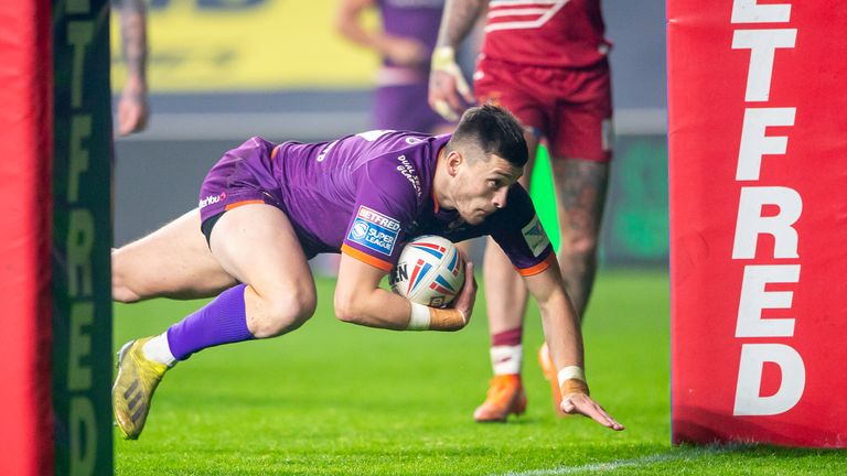 Huddersfield's Sam Wood scores a try against the Warrior