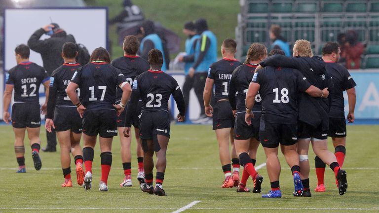 Saracens players walk off the pitch after their Gallagher Premiership match against Bath Rugby in October