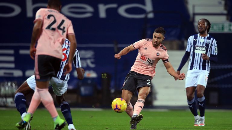 Sheffield United's George Baldock shoots over against West Brom