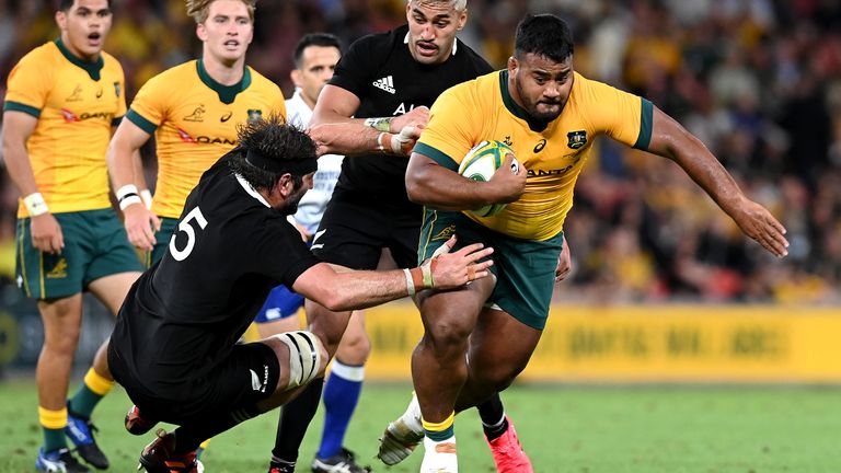 Taniela Tupou gets through the tackle of Sam Whitelock