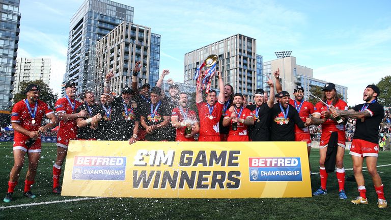 Picture by Vaughn Ridley/SWpix.com - 05/10/2019 - Rugby League - Betfred Championship Grand Final - Toronto Wolfpack v Featherstone Rovers - Lamport Stadium, Toronto, Canada - Captain Josh McCrone of the Toronto Wolfpack lifts the Betfred Championship Trophy.