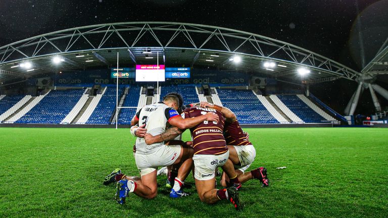 Picture by Alex Whitehead/SWpix.com - 11/03/2020 - Rugby League - Coral Challenge Cup - Toronto Wolfpack v Huddersfield Giants - John Smith's Stadium, Huddersfield, England - Toronto and Huddersfield players after the game.