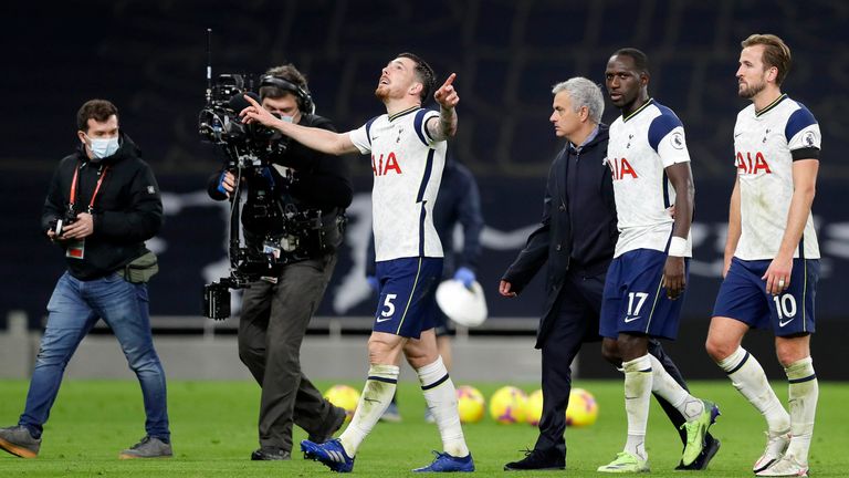 Jose Mourinho and his Spurs players celebrate the victory
