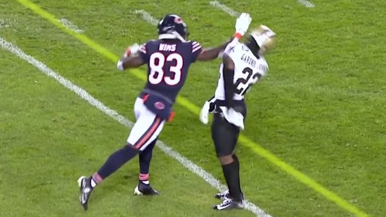Javon Wims punches CJ Gardner-Johnson during the Bears clash with the Saints. 