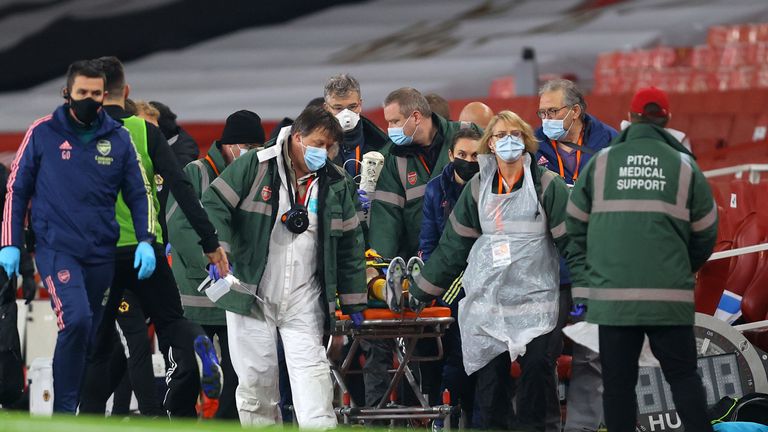  Raul Jimenez of Wolverhampton Wanderers is stretchered off after colliding with David Luiz (Not pictured) of Arsenal during the Premier League match between Arsenal and Wolverhampton Wanderers at Emirates Stadium on November 29, 2020 in London, England