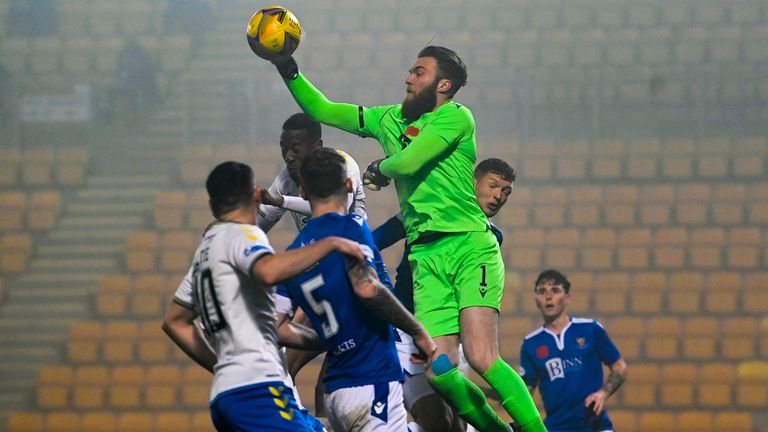 Zander Clark rises to clear a Kilmarnock chance in the second half