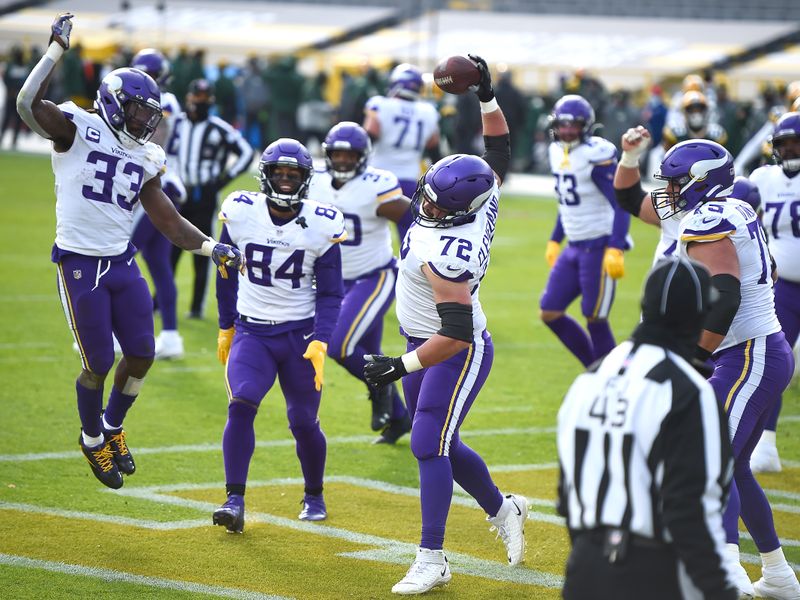 Minnesota Vikings running back Dalvin Cook walks on the field before an NFL  wild card playoff football game against the New York Giants, Sunday, Jan.  15, 2023, in Minneapolis. (AP Photo/Charlie Neibergall