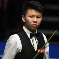 China's Zhou Yuelong has a bright future ahead of him, according to John Higgins