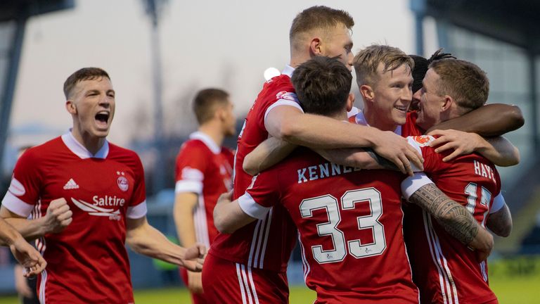 (L-R) Aberdeen's Lewis Ferguson, Matthew Kennedy, Ross McCrorie and Jonny Hayes celebrate Aberdeen's goal