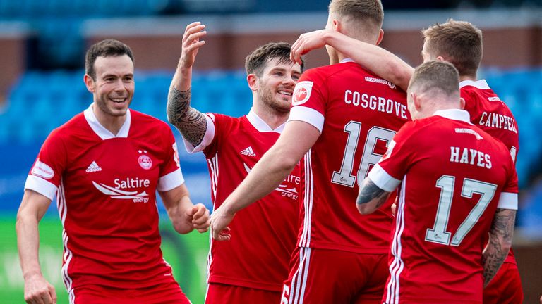 Sam Cosgrove celebrates the second goal with team-mates