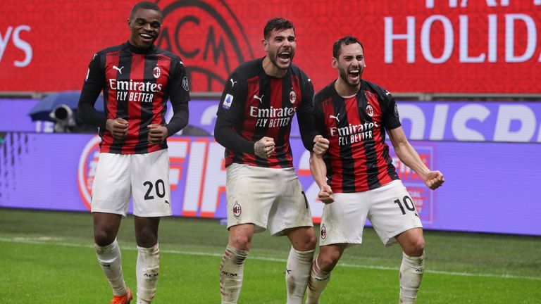 Theo Hernandez with team-mates Hakan Calhanoglu and Pierre Kalulu after heading AC Milan&#39;s winner