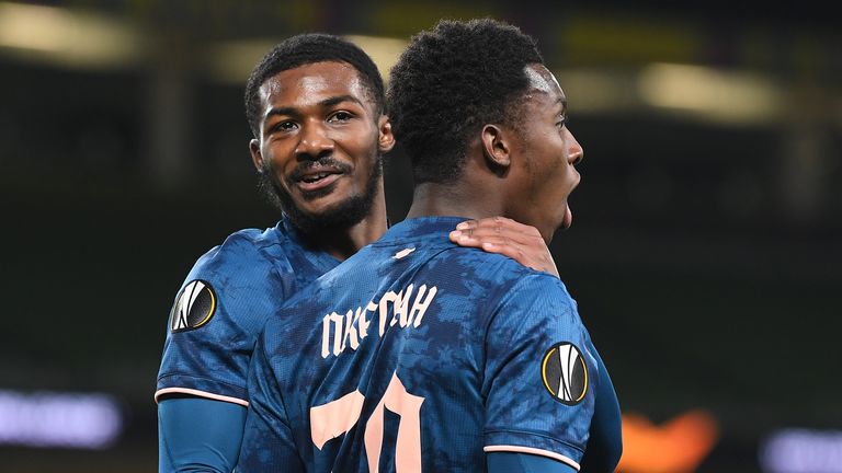 Eddie Nketiah and Ainsley Maitland-Niles celebrate Arsenal's win