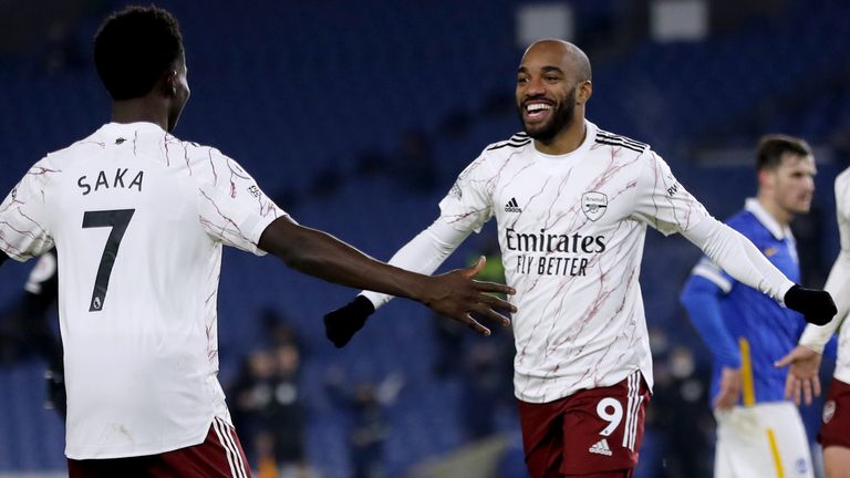 Alexandre Lacazette celebrates scoring shortly after coming on as a substitute