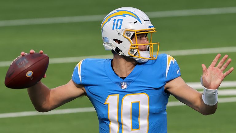 Los Angeles Chargers quarterback Justin Herbert set the NFL rookie single-season passing record with his 28th touchdown pass of the season.
