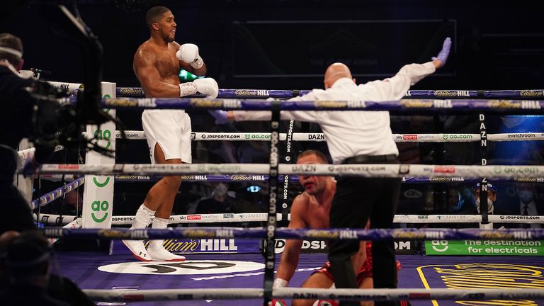 HANDOUT PICTURE COMPLIMENTS OF MATCHROOM BOXING.Anthony Joshua vs Kubrat Pulev, IBF, WBA, WBO & IBO World Title..13 December 2020.Picture By Dave Thompson.Anthony Joshua watches as Pulev receives the count. 