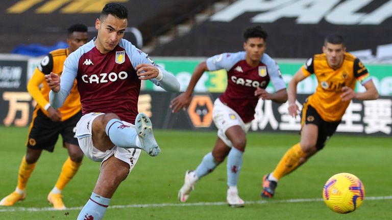 Anwar El Ghazi scores from the penalty spot for Aston Villa against Wolves
