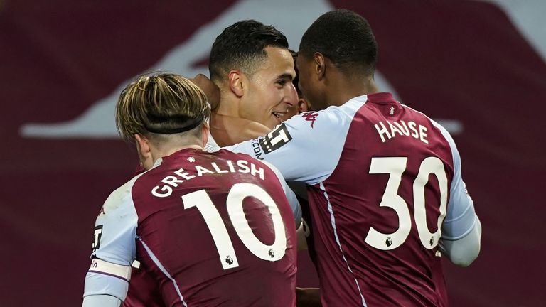 Anwar El Ghazi celebrates scoring Villa's third with his team-mates