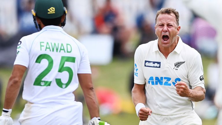 AP Newsroom - New Zealand's Neil Wagner, right, celebrates the wicket of Pakistan's Fawad Alam, left, during play on day three of the first Test between Pakistan and New Zealand at Bay Oval, Mount Maunganui, New Zealand, Monday, Dec. 28, 2020. (Andrew Cornaga/Photosport via AP)