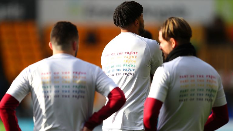 WOLVERHAMPTON, ENGLAND - DECEMBER 12: Tyrone Mings of Aston Villa is seen wearing a T-Shirt reading &#39;Part of the Pride&#39; as Aston Villa show their support for the Stonewall Rainbow Laces campaign prior to the Premier League match between Wolverhampton Wanderers and Aston Villa at Molineux on December 12, 2020 in Wolverhampton, England. The match will be played without fans, behind closed doors as a Covid-19 precaution. (Photo by Catherine Ivill/Getty Images)
