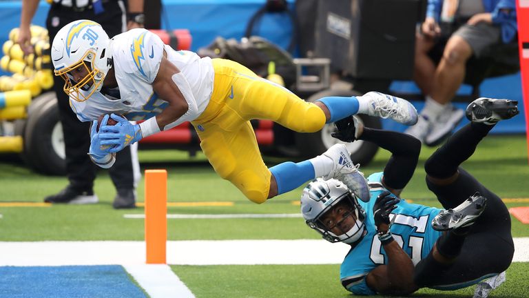 Ekeler dives over for the touchdown against the Panthers in Week Three