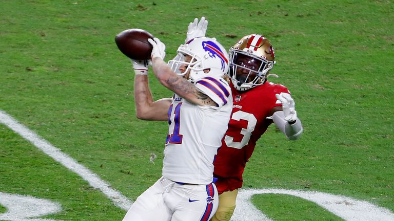 Cole Beasley of the Buffalo Bills makes a reception against coverage from defensive back Tarvarius Moore of the San Francisco 49ers 