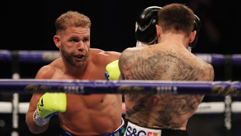 Billy Joe Saunders fires a straight left through the guard of Martin Murray - credit Matchroom Boxing