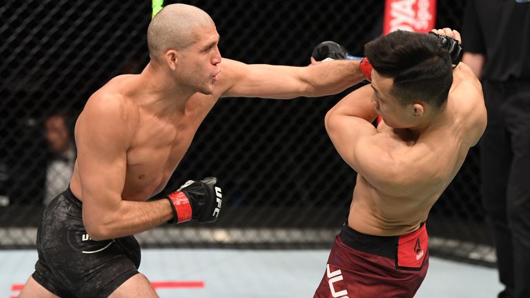 In this handout image provided by UFC, (L-R) Brian Ortega punches The Korean Zombie Chan Sung Jung in their featherweight bout during the UFC Fight Night event inside Flash Forum on UFC Fight Island on October 18, 2020 in Abu Dhabi, United Arab Emirates. 